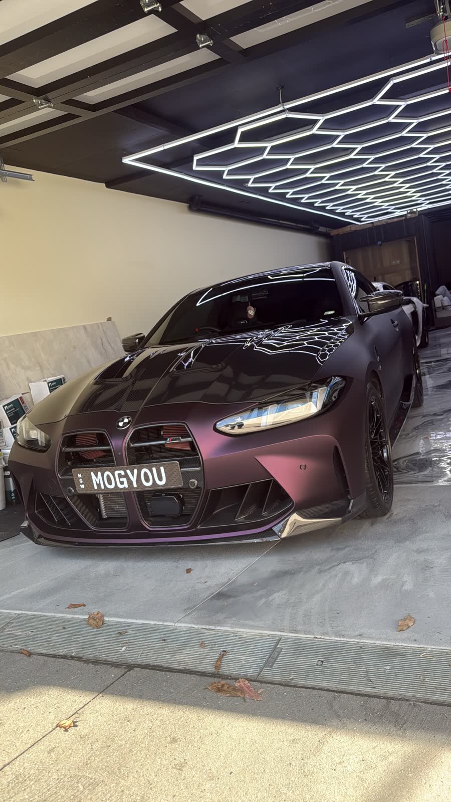BMW M4 in a garage after detailing
